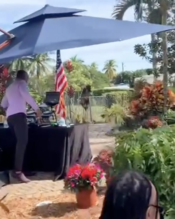 Outdoor garden event with DJ setup