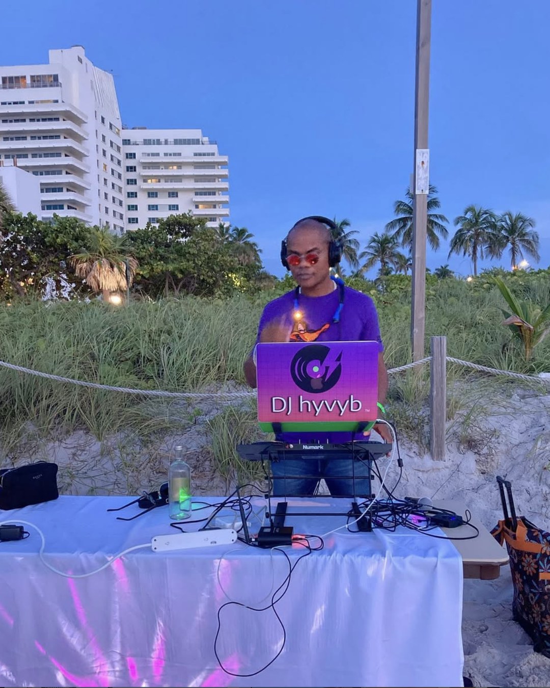 DJ Hyvyb performing live on Miami Beach at sunset